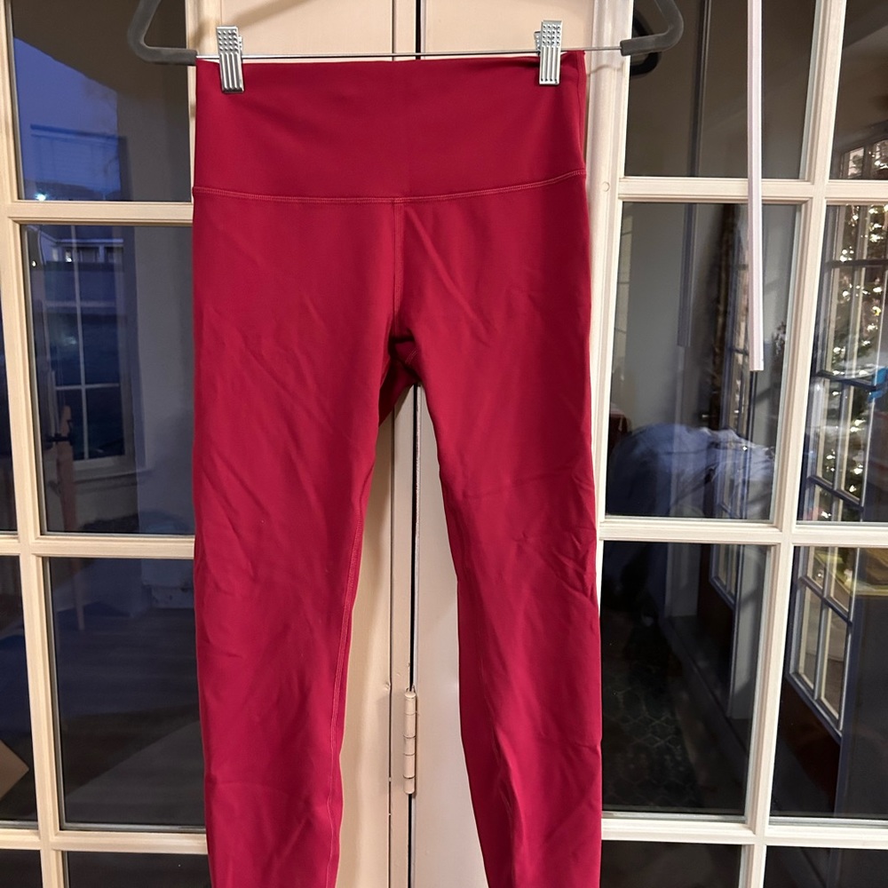 Lululemon Wunder 7/8 Tight. Pomegranate. Size 8. EUC. $37